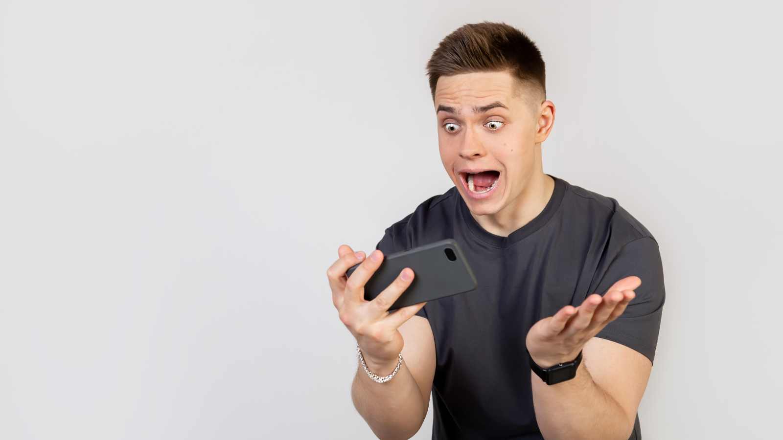 Man shocked seeing phone