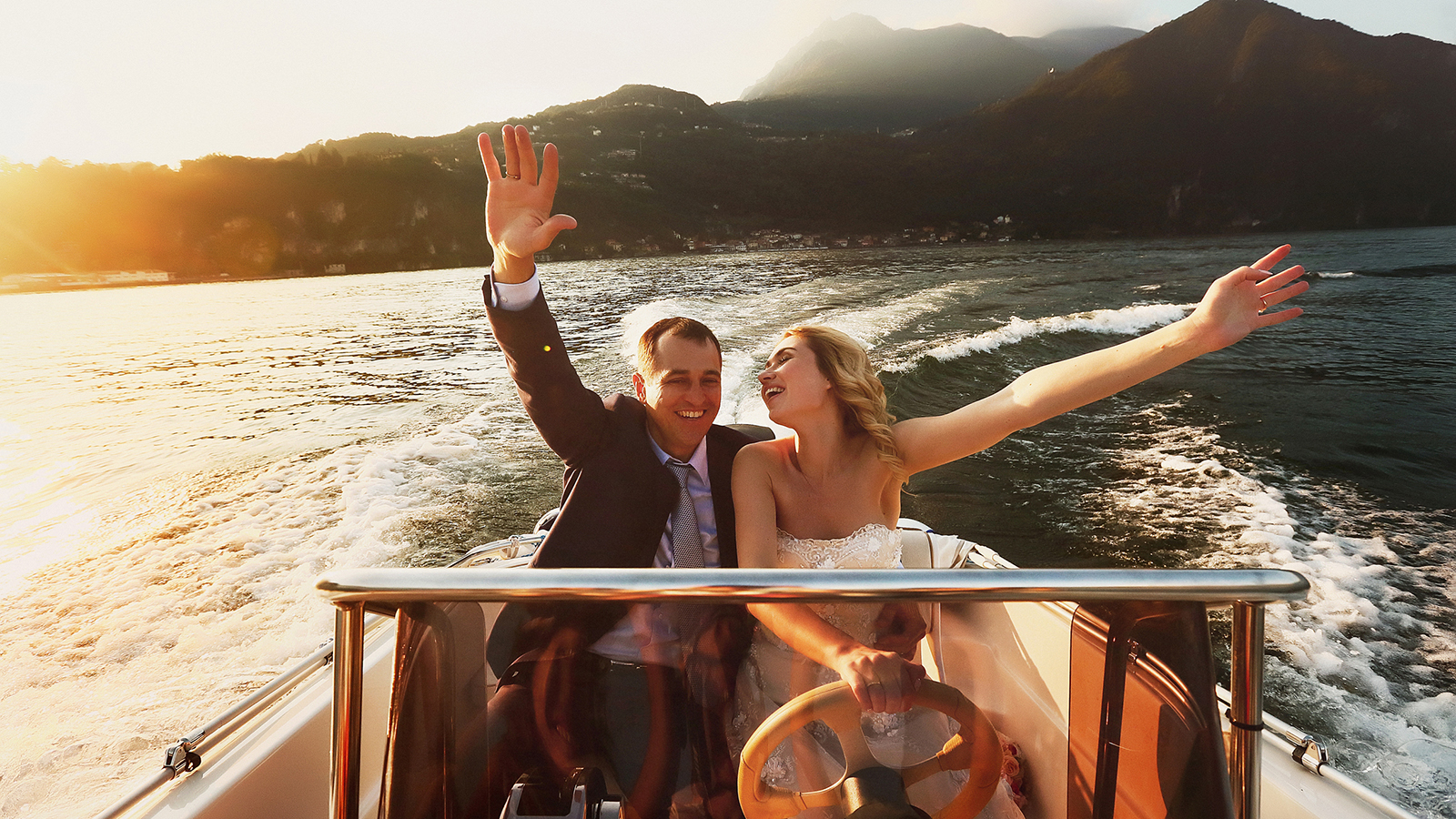wedding couple on boat, sunset