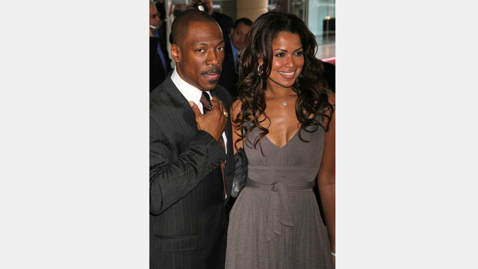 Eddie Murphy and Tracey Edmonds at the luncheon for the nominees of the 79th Annual Academy Awards. Beverly Hilton Hotel, Beverly Hills, Ca. 02-05-07