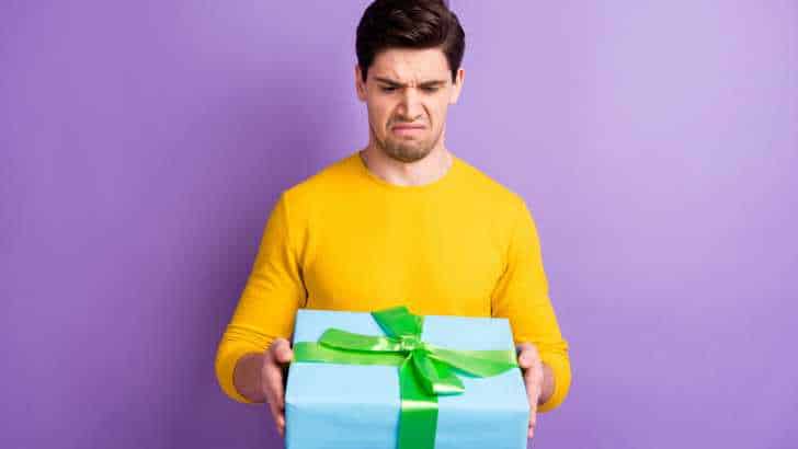 Upset Man with gift