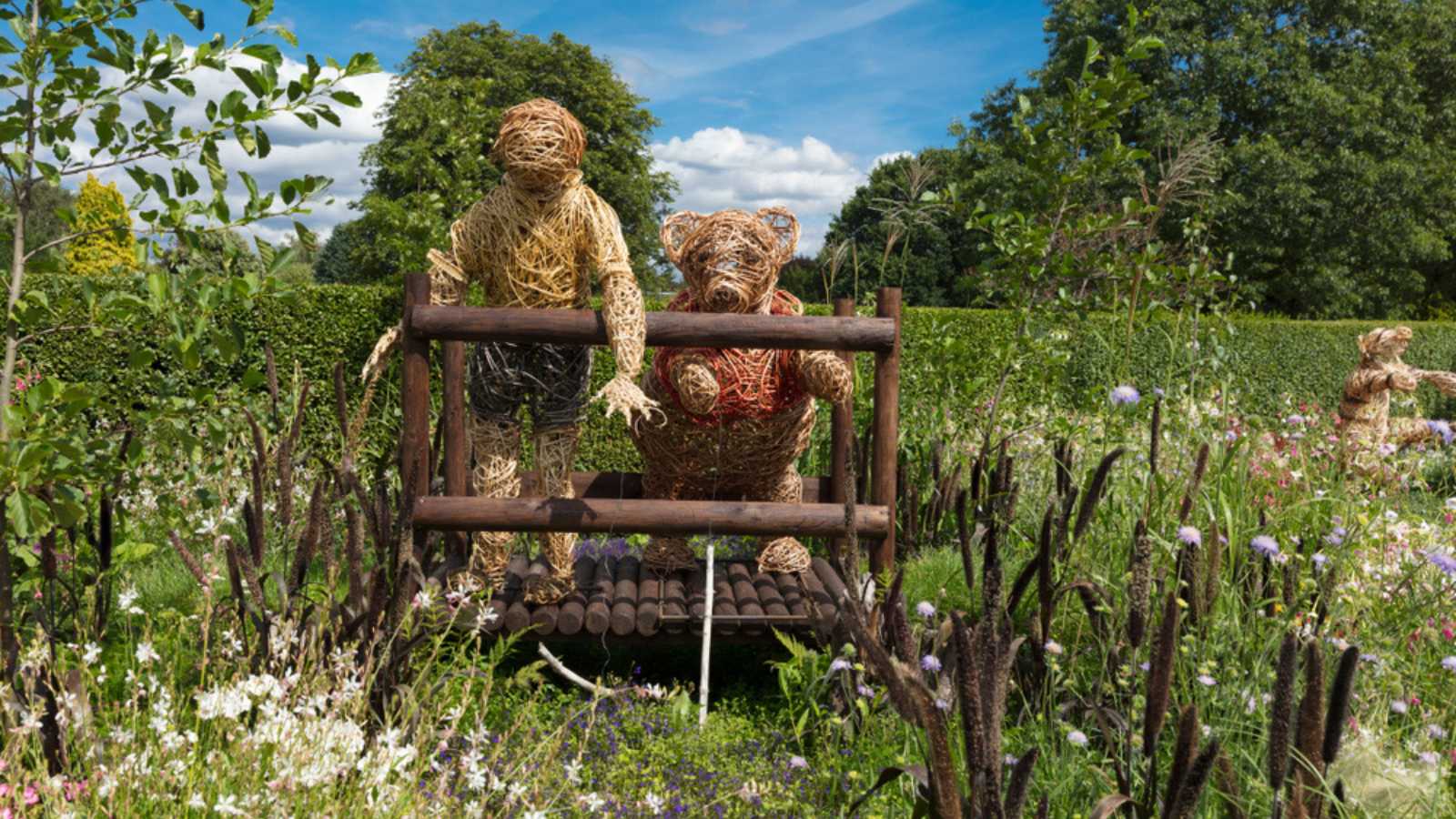 A Winnie the Pooh themed garden display in Homestead Park, York, North Yorkshire, UK - 4th August 2018