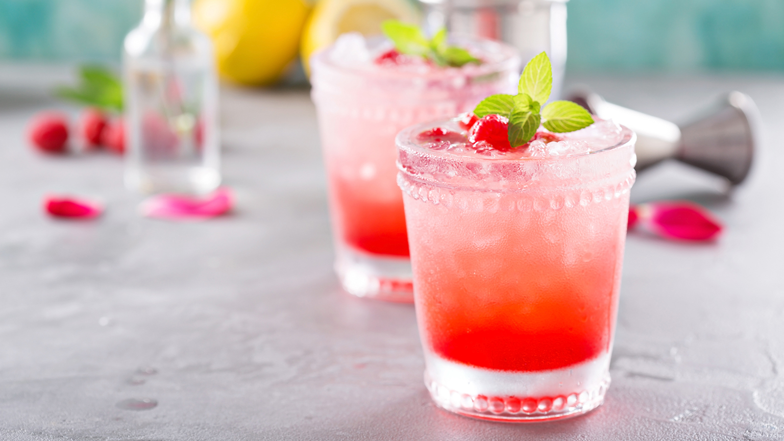 Raspberry crushed ice cold refreshing cocktail with mint