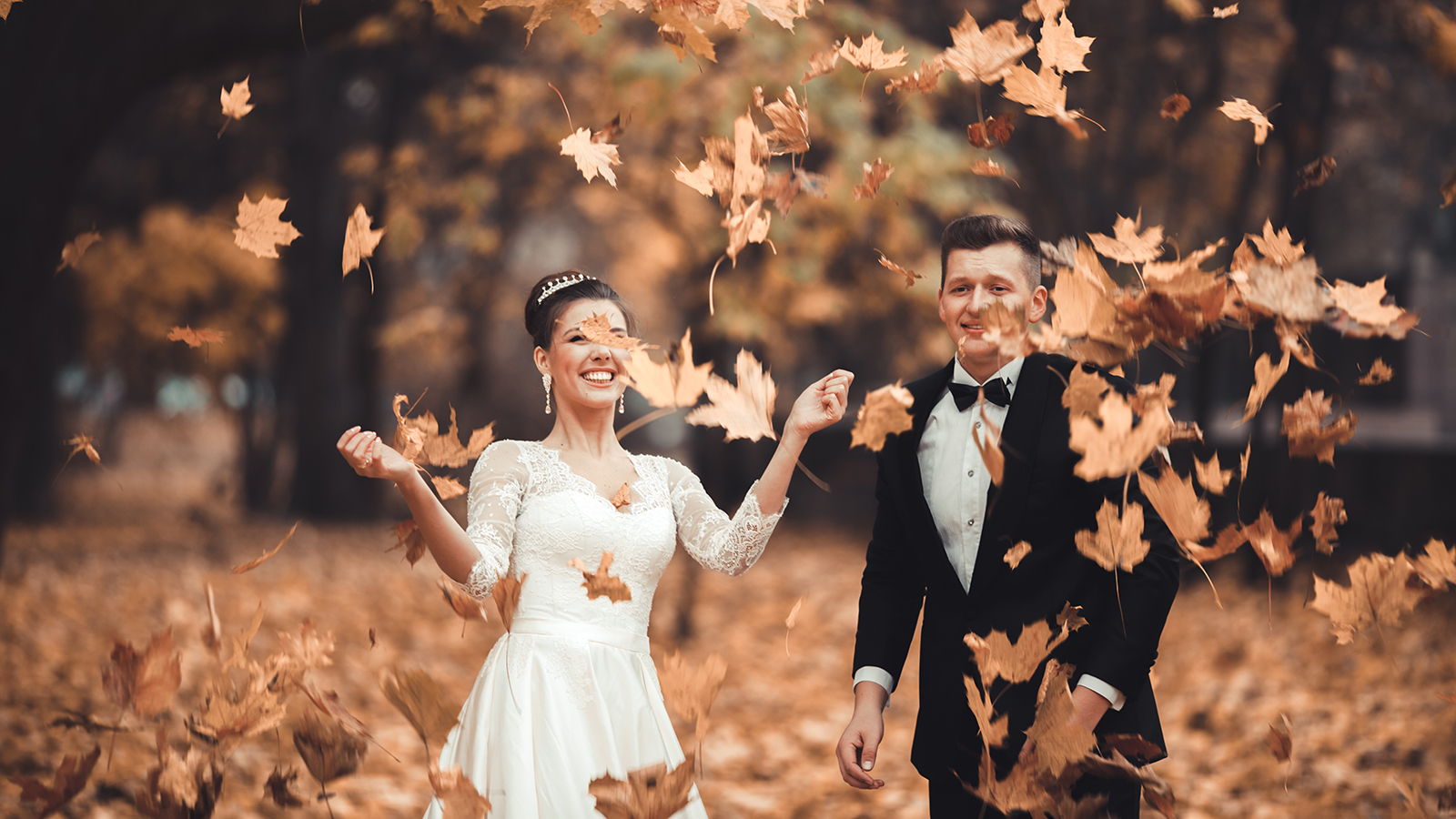 Luxury married wedding couple, bride and groom posing in park autumn.