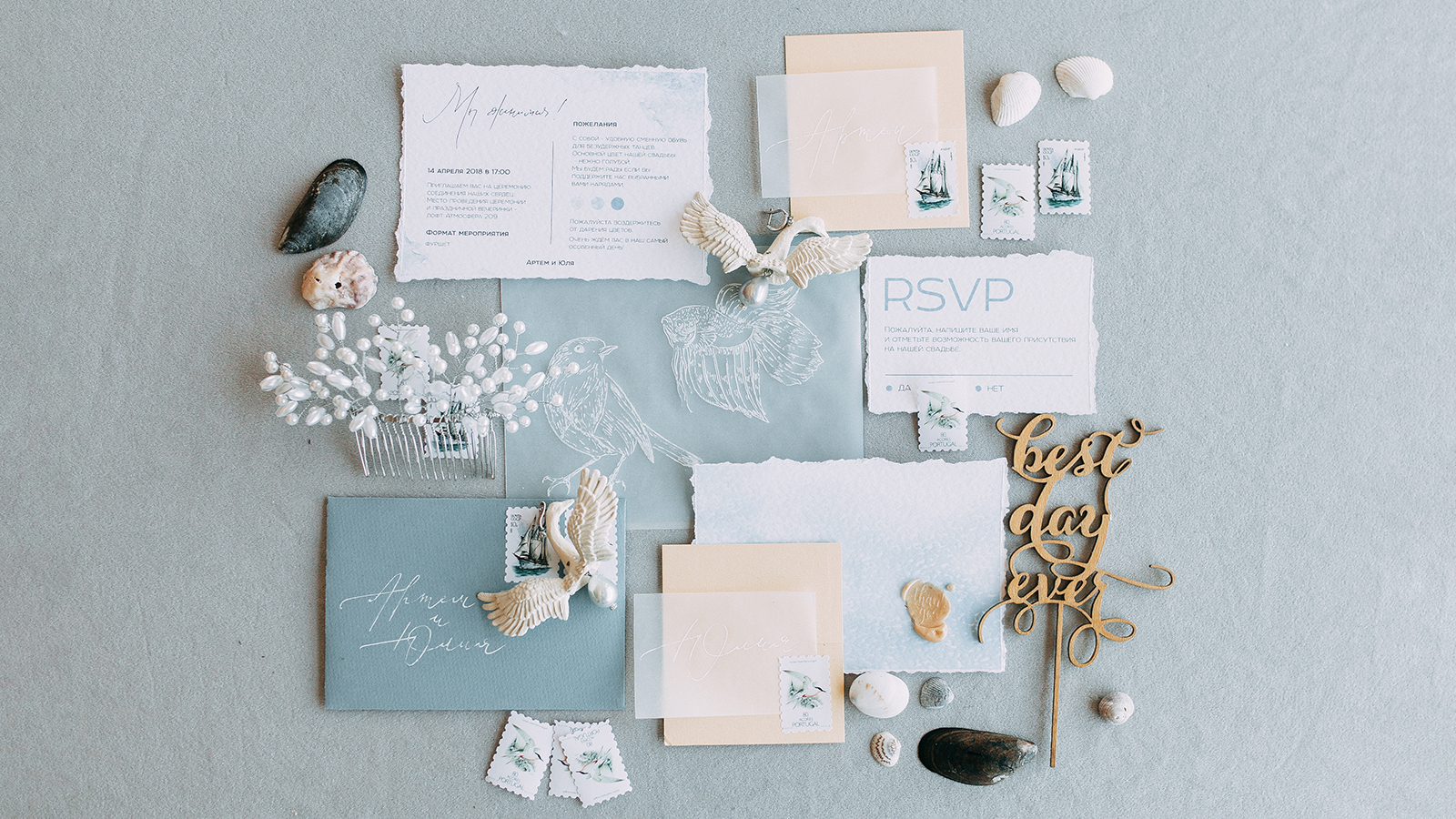 Stylish printing at the wedding ceremony, beautiful details and decor with flowers and rings. Wedding invitations made by hand with calligraphy
