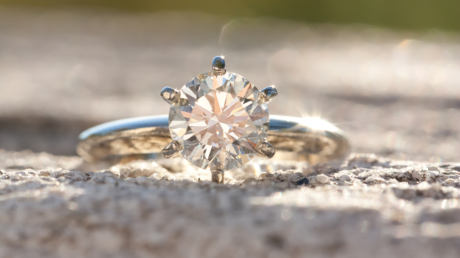 Stunning 1.5 carat diamond solitaire ring sparkles in the sun.