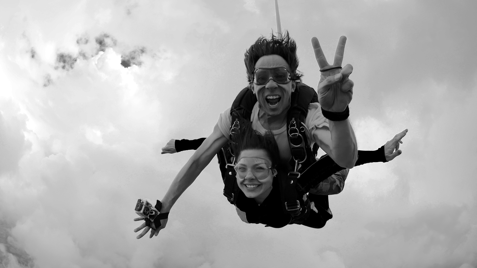 Skydiving tandem happiness black and white