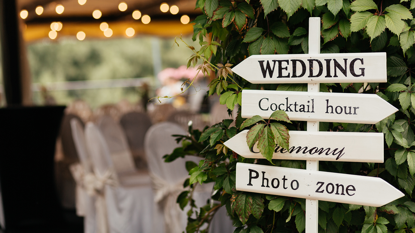 Sign for guests to help them to find the place of wedding, photo zone, cocktails, ceremony made from wood