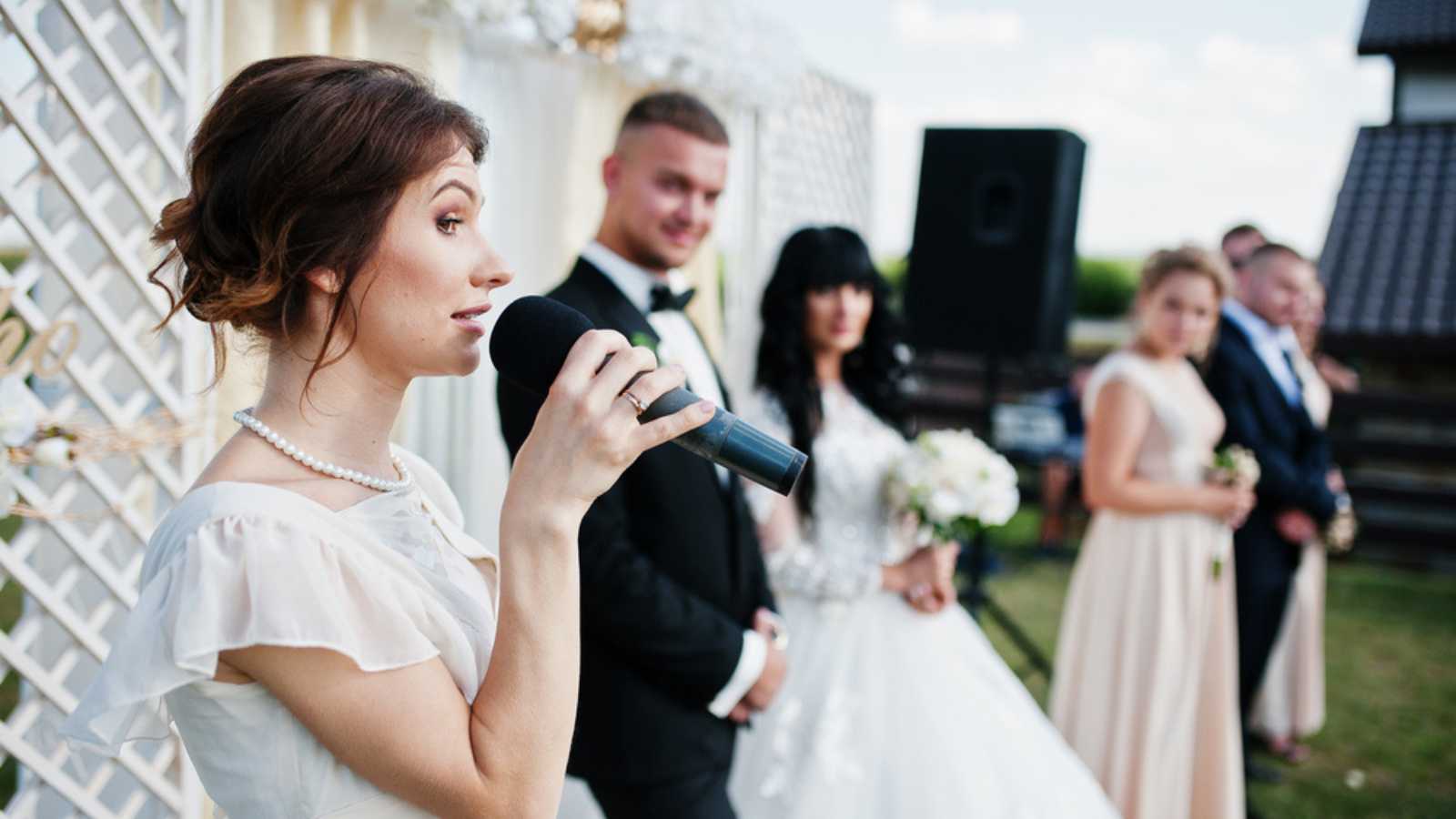 Bridesmaid giving speech in wedding