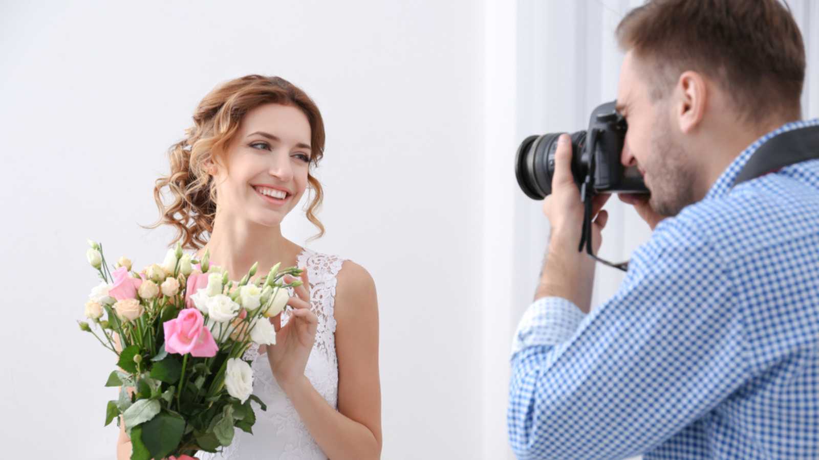 Photographer taking picture at wedding