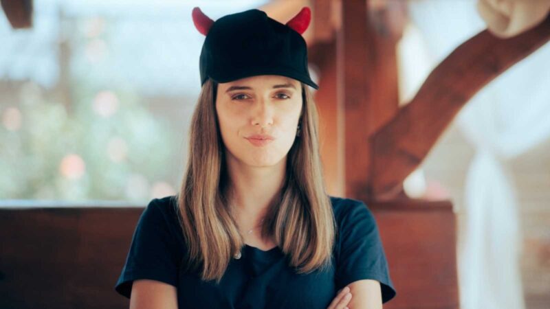 Upset Girlfriend Wearing a Devil Horned Hat