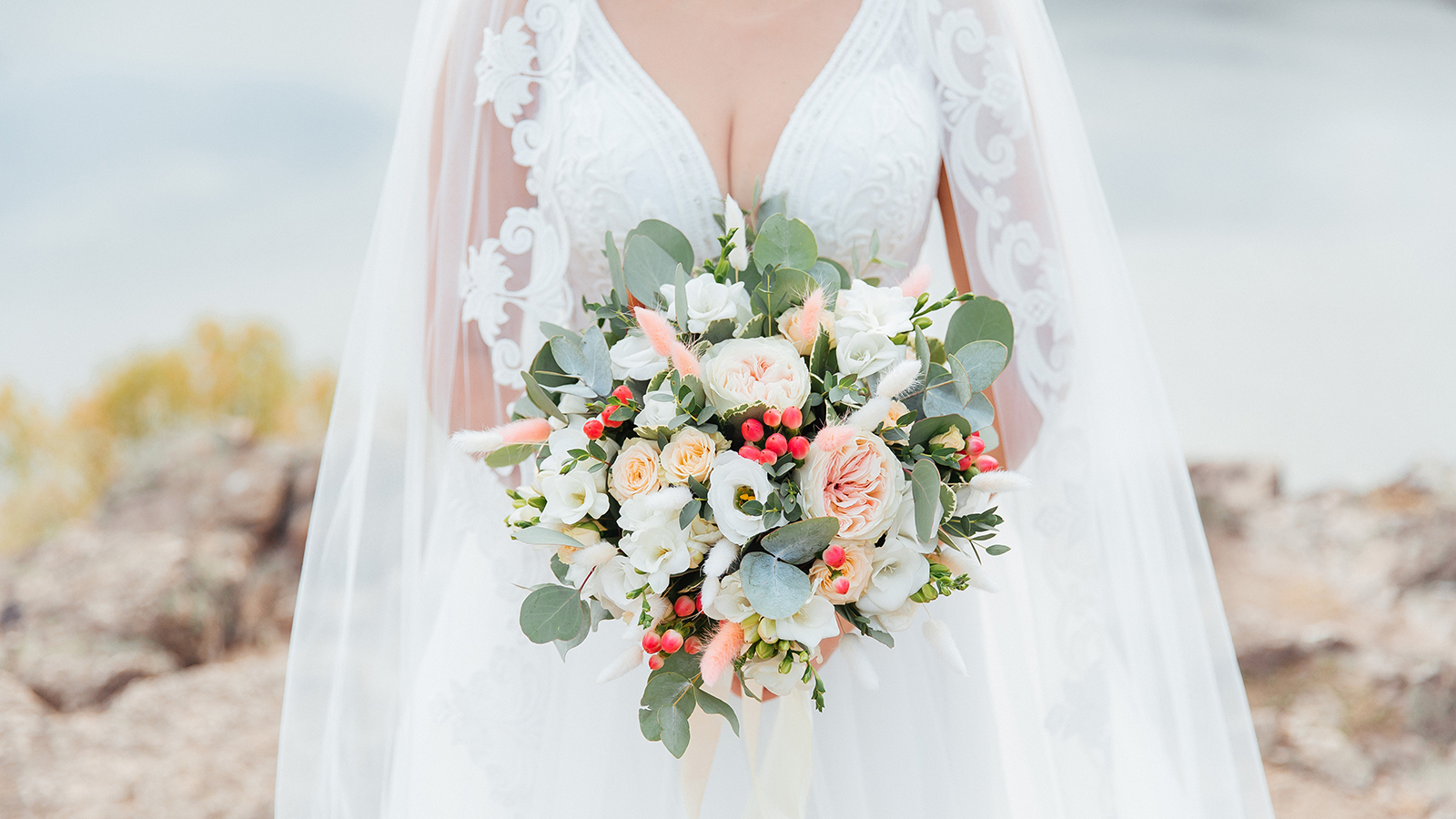 luxurious bouquet in the hands of the bride in a wedding dress