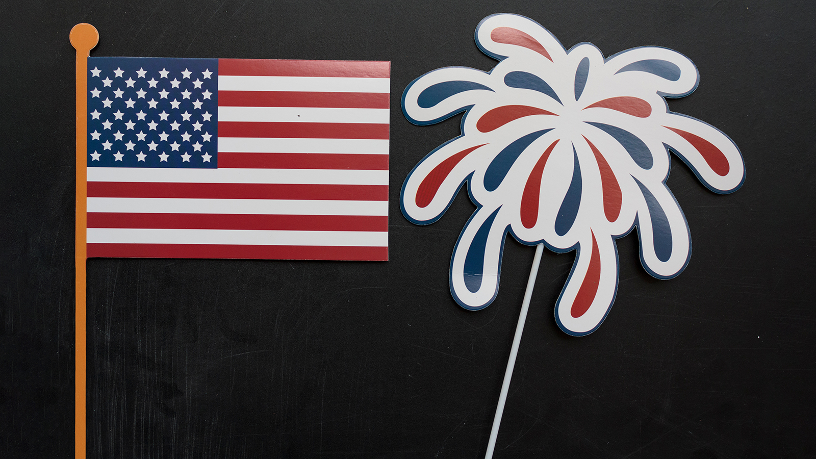 American flag and firework props. USA holiday, 4 of July, celebration concept.