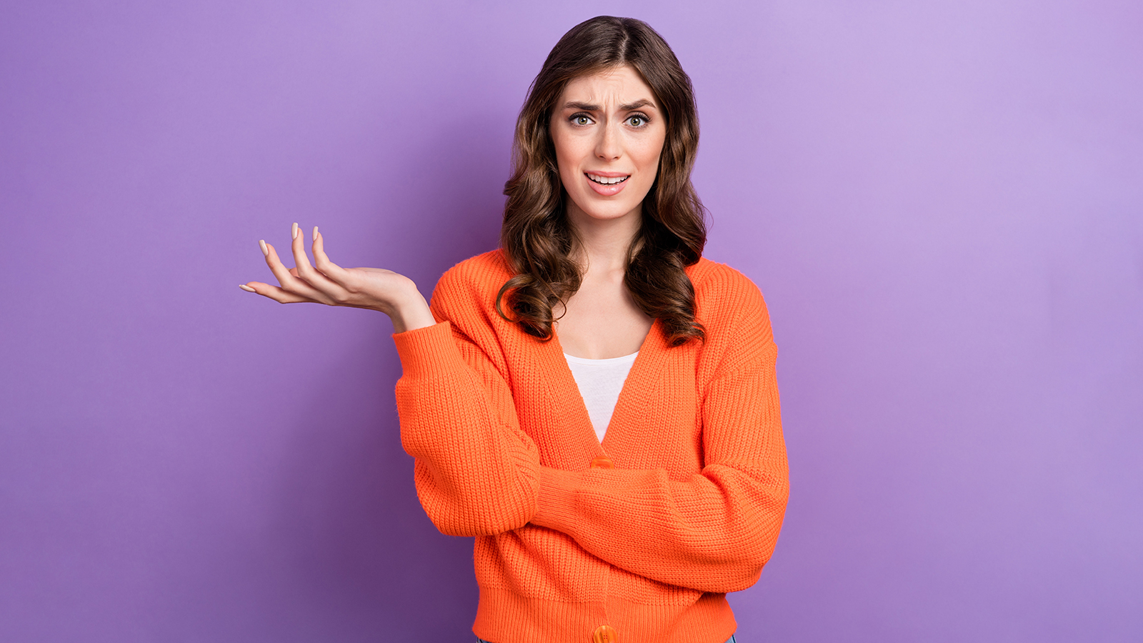 Portrait of unsatisfied pretty person raise arm palm conflict isolated on purple color background