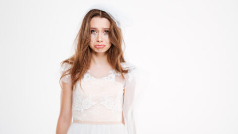 Sad bride. Isolated white background