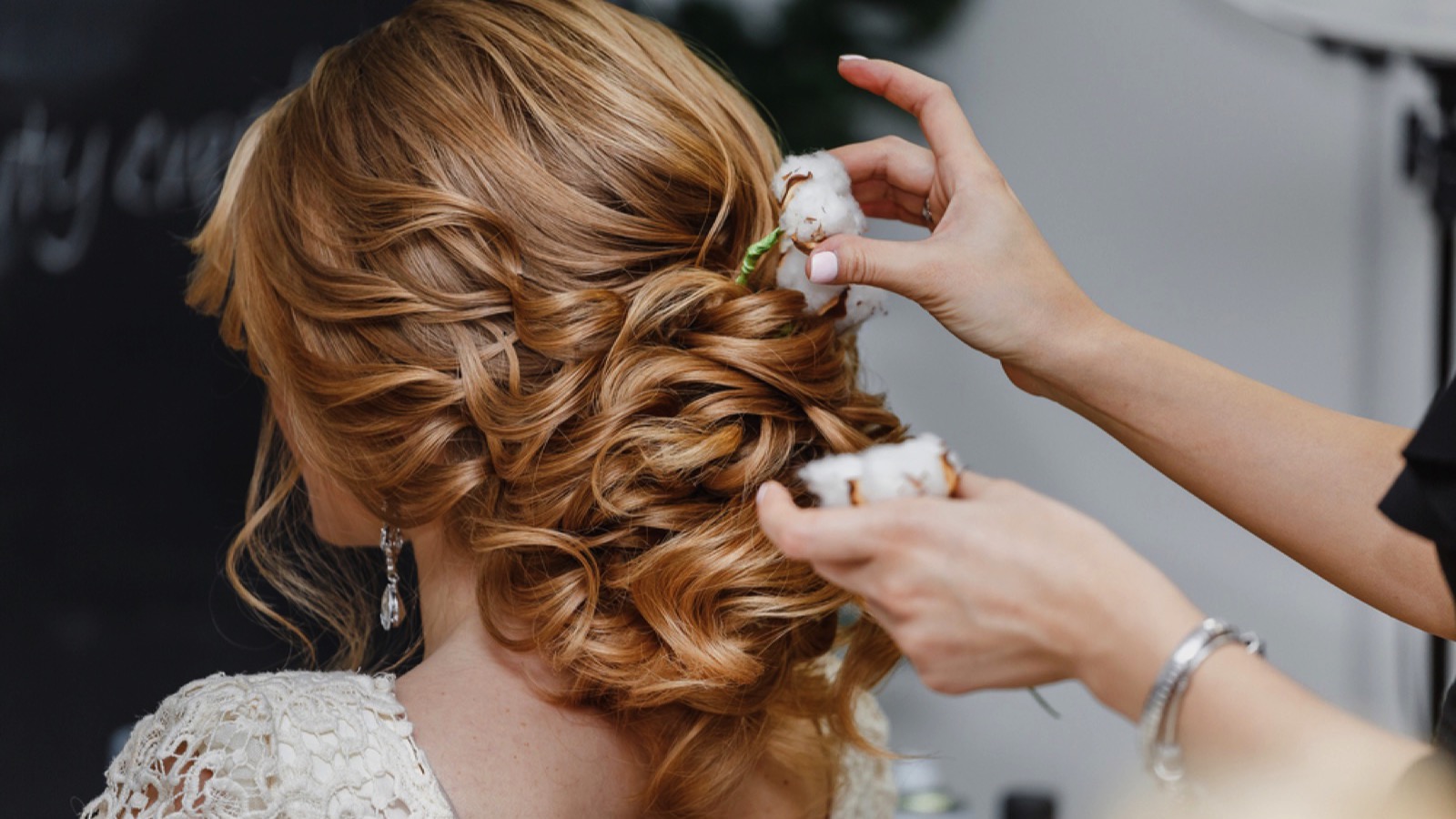 Bride doing hair