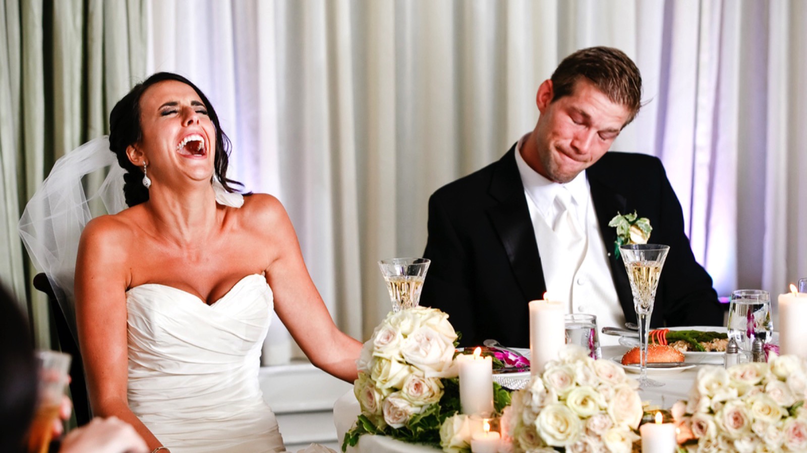 Bride laughing for the speech
